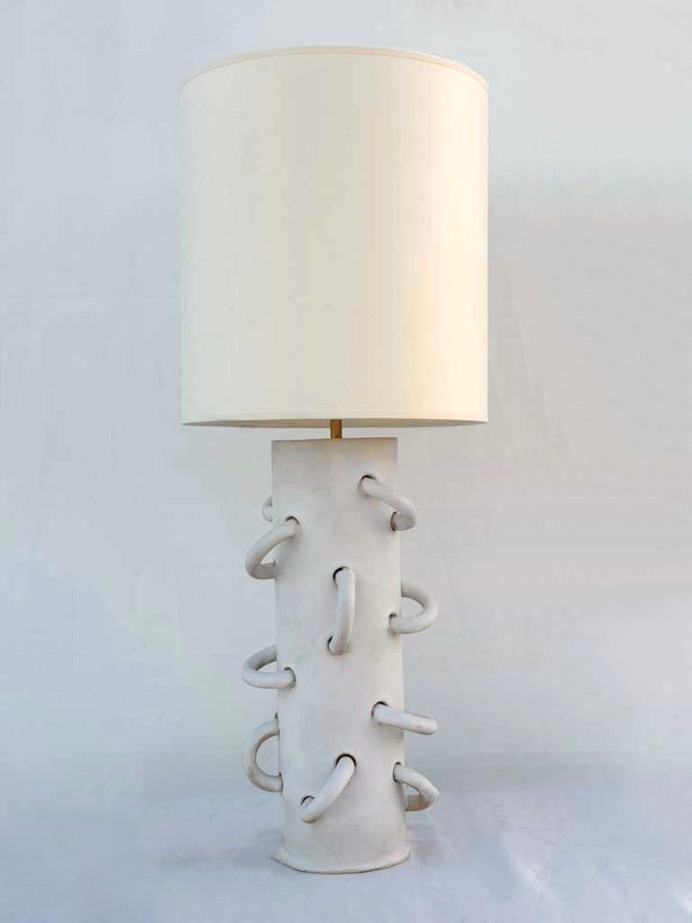 Heavier glazed, white loop lamp with solid off-white paper shade